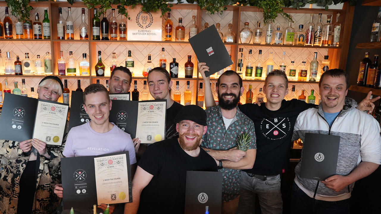 EBS students with certificates at Tiki Course